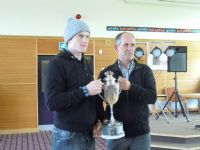 Alan Blair presents Martyn Irvine with the Red Had Trophy